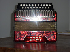 Red Hohner accordion