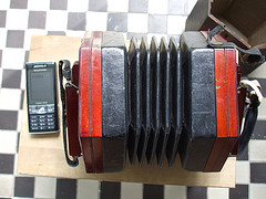 Red and black used accordion